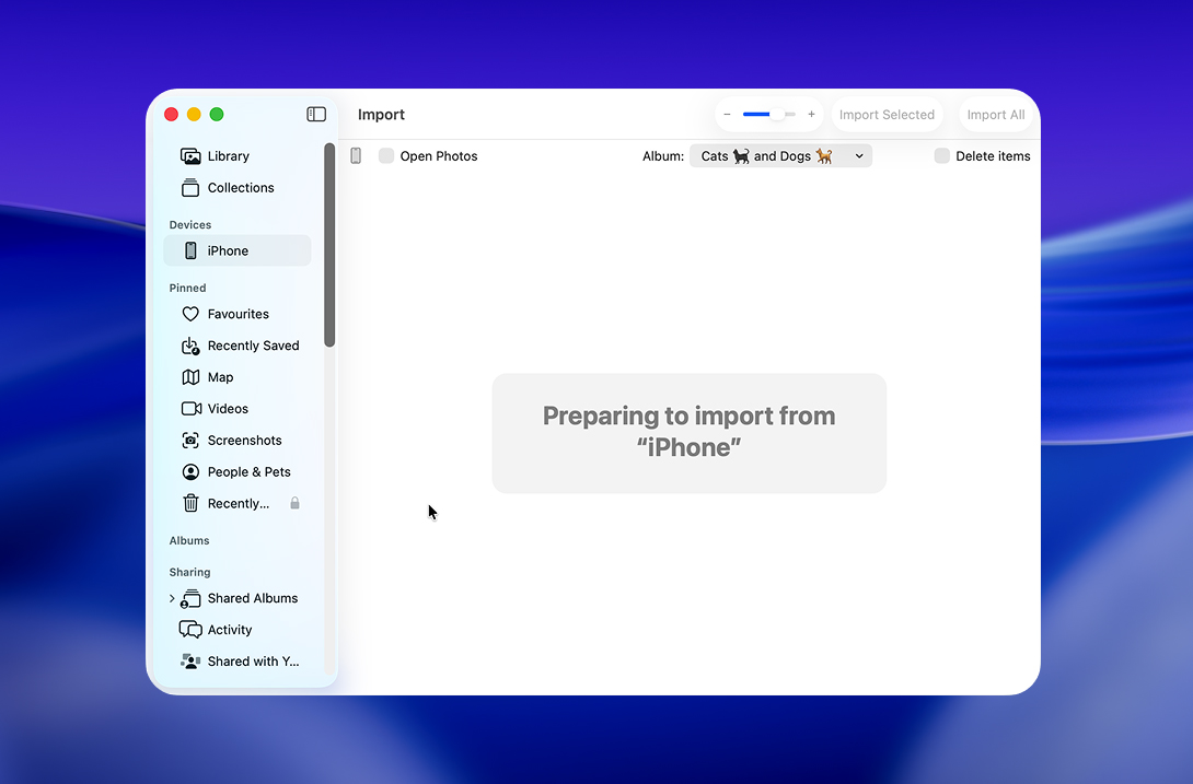 Opening the iPhone import screen in Photos on Mac